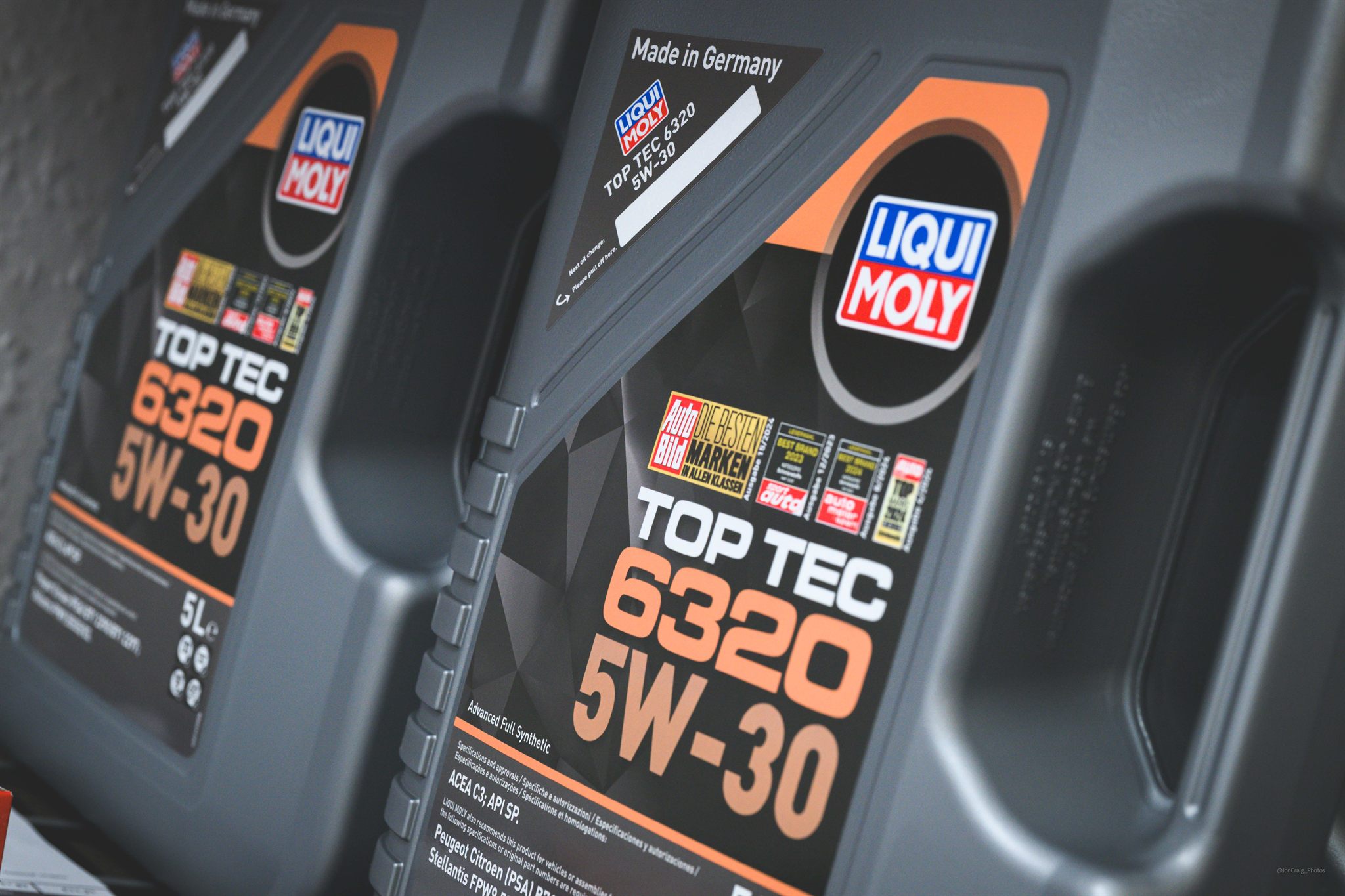 Premium engine oils, brake fluid, and service fluids ready for servicing