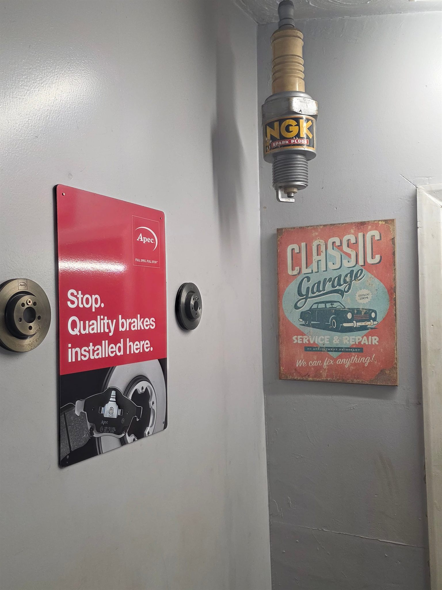 Langdon Motors reception entrance with awards and heritage signs